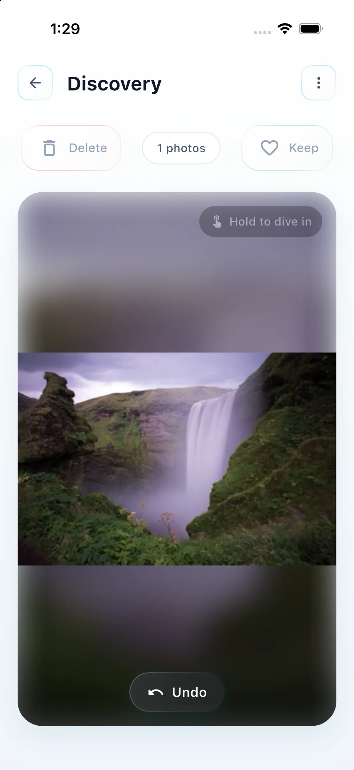 The current SwipeLah Discovery screen displaying a waterfall with one photo remaining and Undo available.